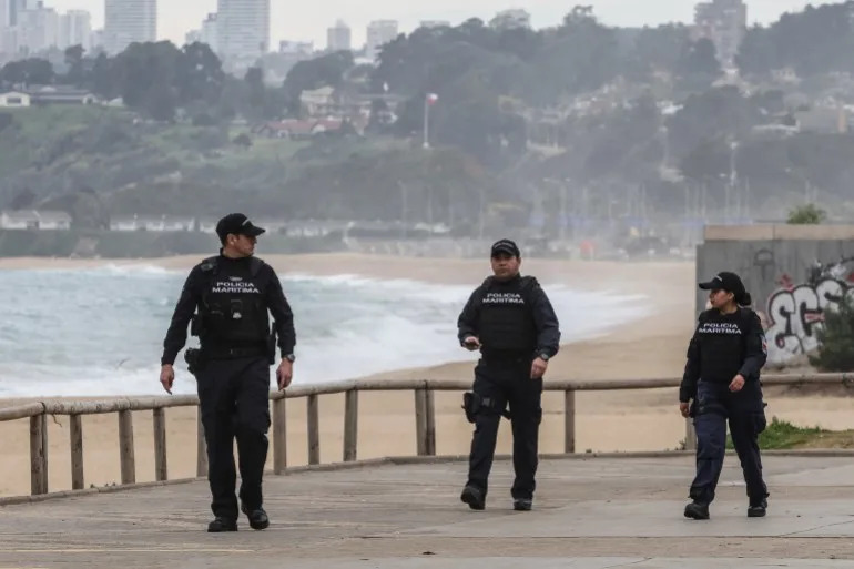 Members of the Chilean police force patrol the coastal area during an evacuation due to a tsunami warning in Viña del Mar, Chile on July 30, 2025. Chile warned on July 29, 2025, of a 