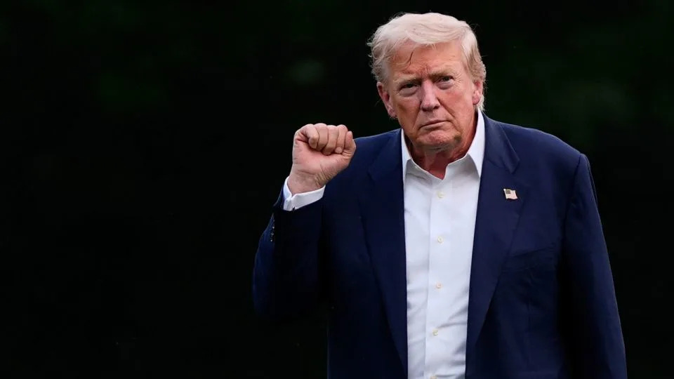 President Donald Trump walks from Marine One after arriving on the South Lawn of the White House, on Tuesday. - Julia Demaree Nikhinson/AP