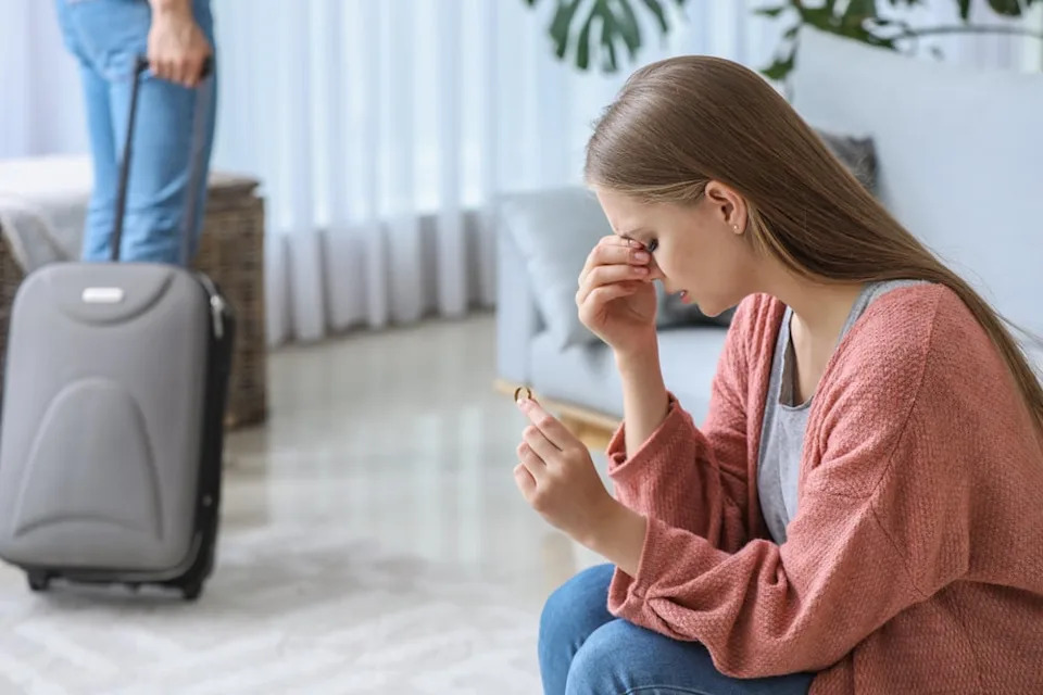 Woman who is upset and about to cry.