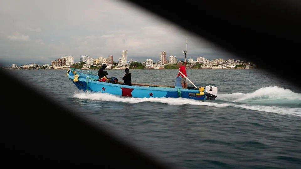 Suspected fuel/drug runner is apprehended by the Navy and brought back to shore in Manta. - Alex Platt