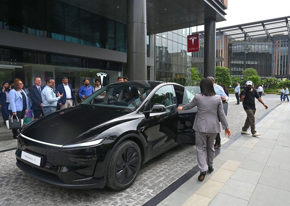 tesla opens showroom in delhi aerocity