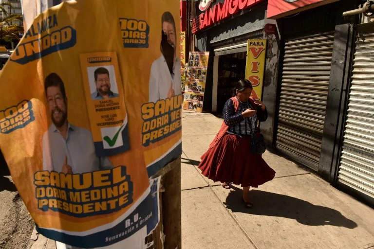 Bolivian right eyes return in elections marked by economic crisis