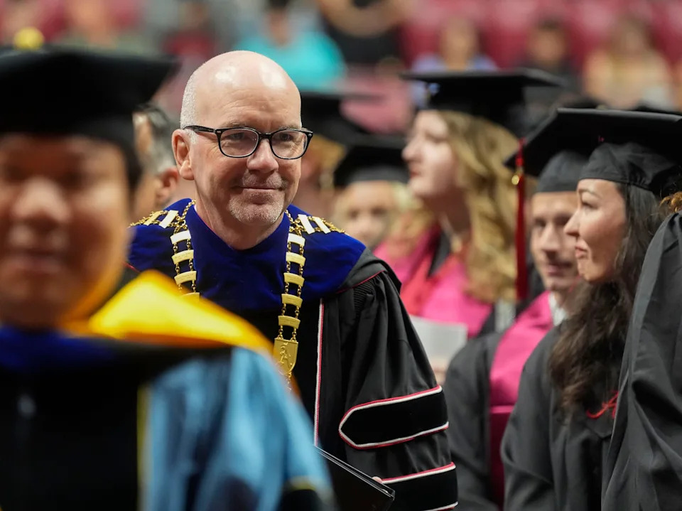 Aug. 2, 2025; Tuscaloosa, AL, USA; The University of Alabama presented 1,240 degrees during the Summer Commencement 2025 in Coleman Coliseum. New University of Alabama President Peter Mohler enters the coliseum for this first commencement at the Capstone.