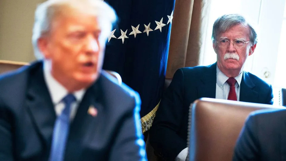 John Bolton listens as President Donald Trump speak during a cabinet meeting at the White House, on April 9, 2018. - Evan Vucci/AP/File