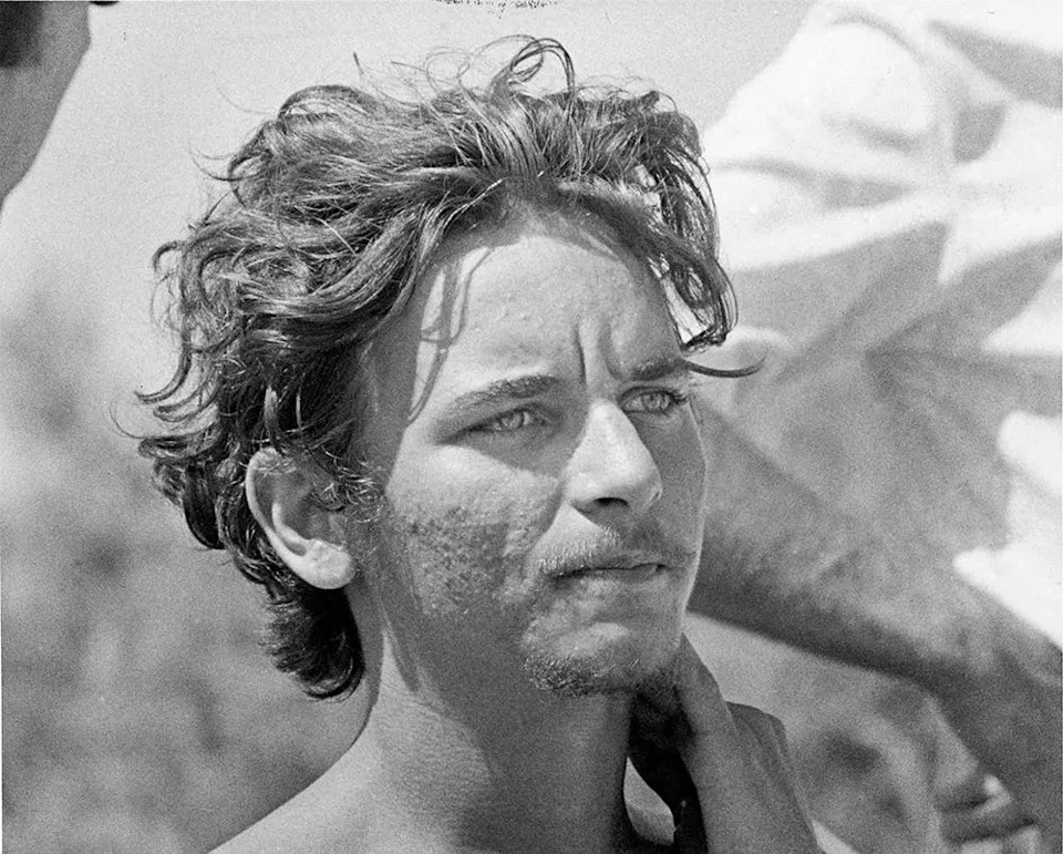 A close-up of Elmer Wayne Henley Jr. looking ahead.