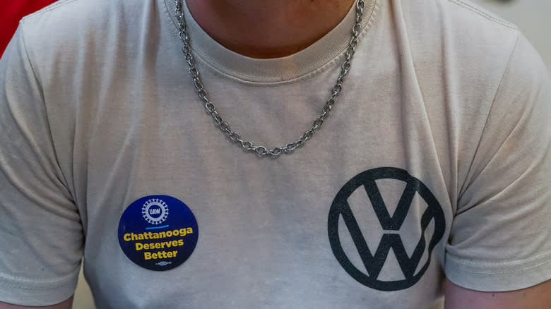 CHATTANOOGA, TENNESSEE - APRIL 19: A man wears a pro-union sticker on his VW shirt at a United Auto Workers (UAW) vote watch party on April 19, 2024 in Chattanooga, Tennessee. With over 51% of workers voting yes the UAW won the right to form a union at the plant.