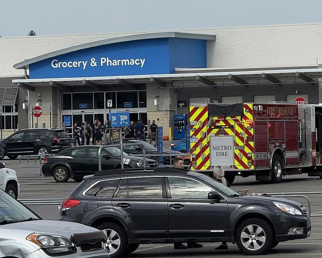 <span>Emergency services respond to the scene in Traverse City on Saturday.</span><span>Photograph: Jan-Michael Stump/AP</span>