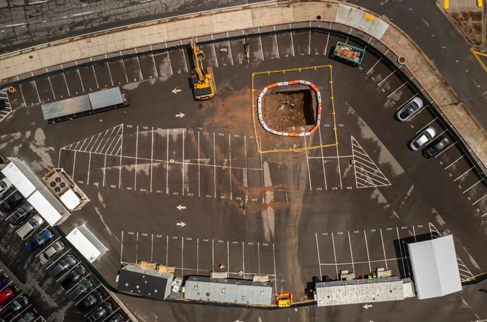 A drone shot shows the initial boring in a state-owned parking lot in downtown Nashville for an underground tunnel for Tesla vehicles. (Photo: John Partipilo/Tennessee Lookout)