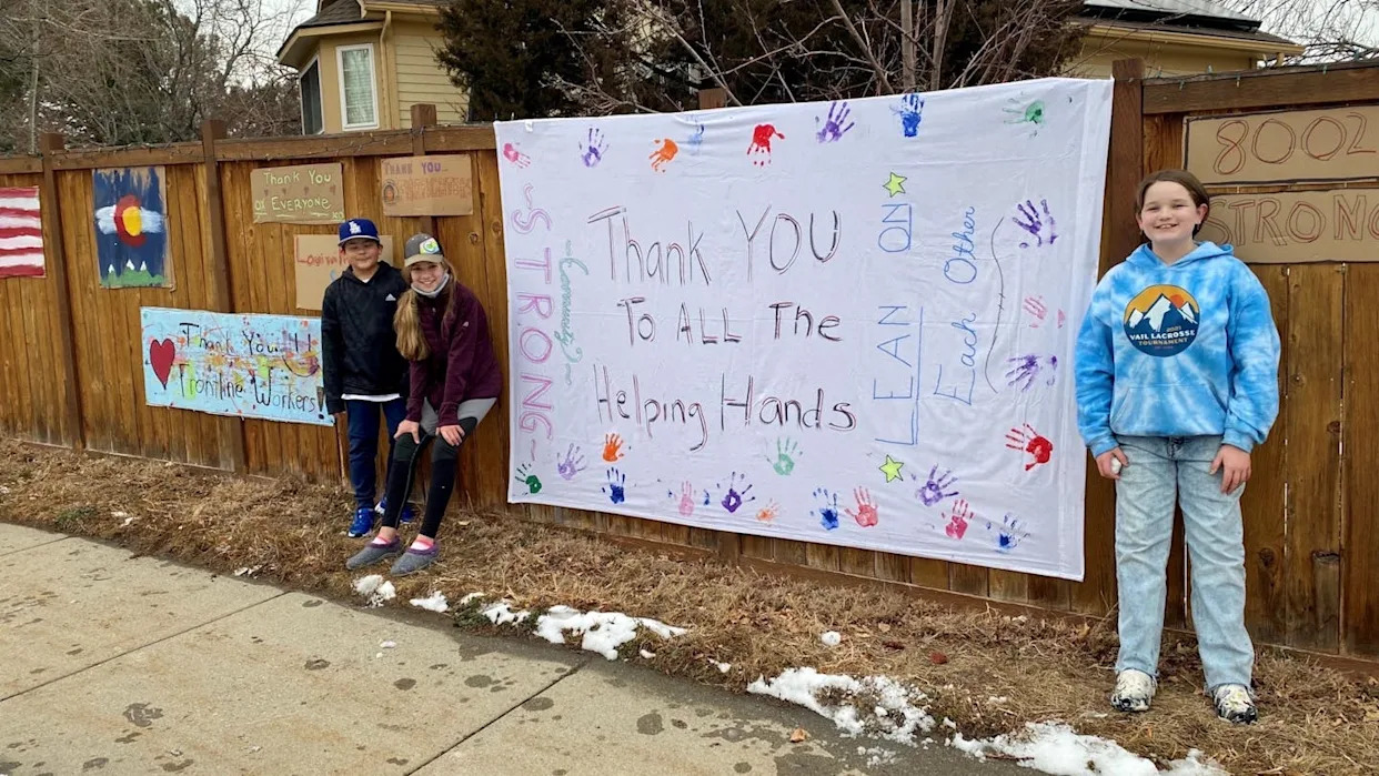 The Marshall Fire impacted people of all ages. Rebecca Slusar organized her children and their friends in the neighborhood to paint signs of community resilience and thanking first responders. Courtesy of the Louisville Historical Museum
