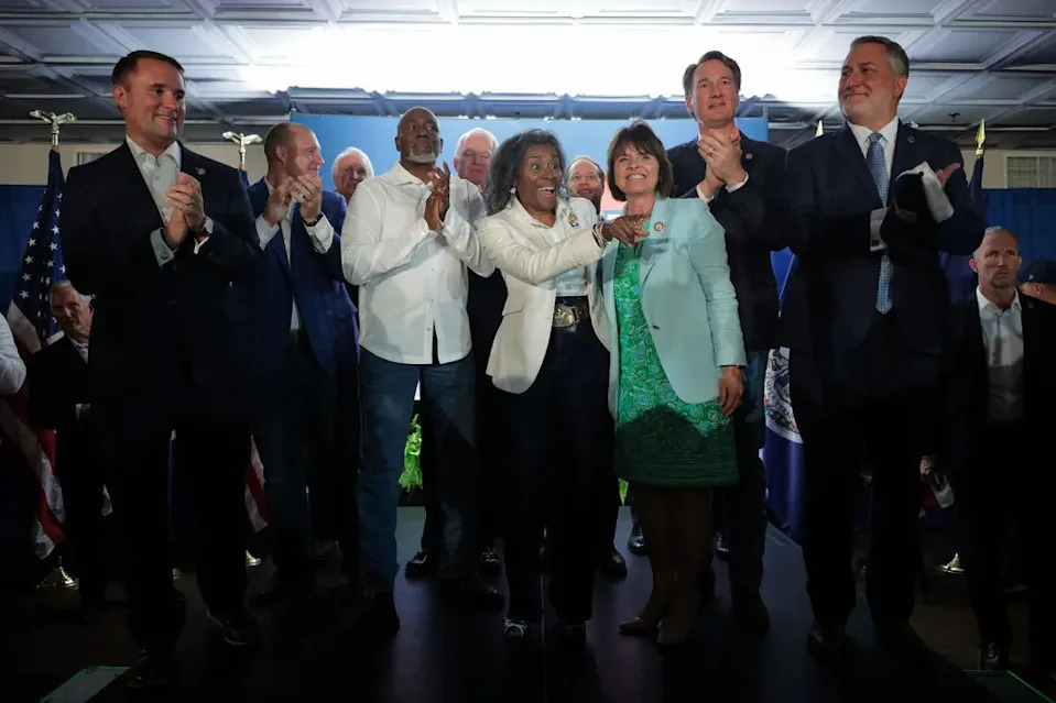 Republican Virginia gubernatorial candidate Winsome Earle-Sear waves to supporters during a campaign event.