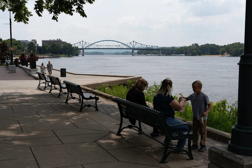 Marie Jossa of Arcadia enjoys a moment on the Mississippi River with family, at the Riverside Park, in La Crosse on the afternoon of Aug. 4, 2025.