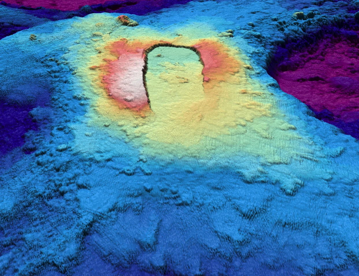 Scientists play a waiting game with a giant volcano off the West Coast