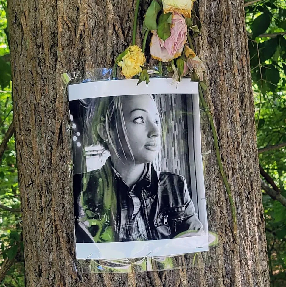 A memorial for Rachel Morin displayed on a tree on the Ma & Pa Trail in Bel Air, Maryland