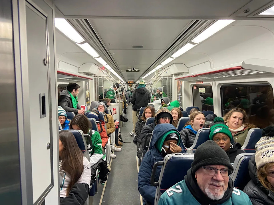 The train was packed with Eagles fans, drinking coffee and more, before the sun rose on Friday, Feb. 14, 2025, before the Super Bowl Parade was set to kick off near the sports complex in Philadelphia.