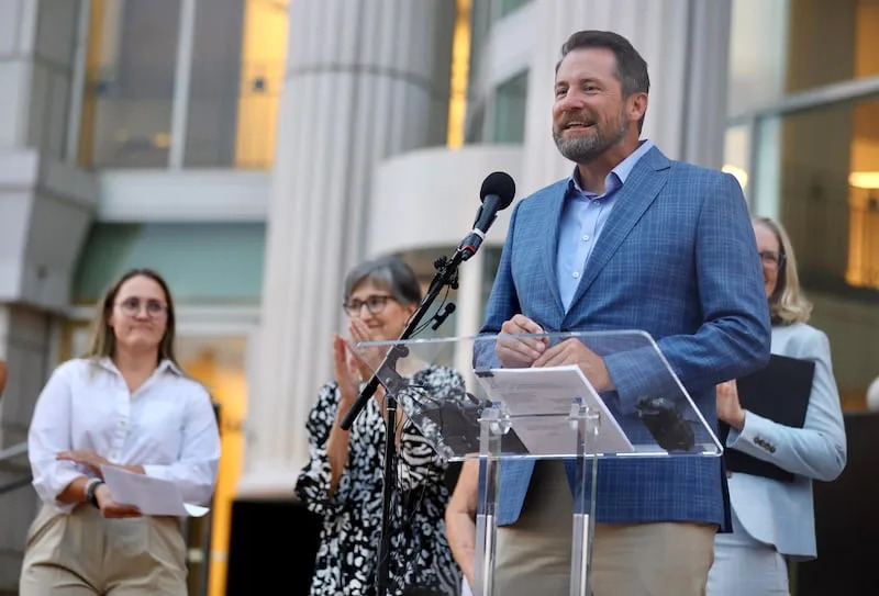 Ryan Bell, Better Boundaries board member celebrates at the Matheson Courthouse in Salt Lake City, Monday Aug. 25, 2025. A judge ruled that the Utah Legislature’s 2021 congressional maps violate the state constitution. | Kristin Murphy, Deseret News