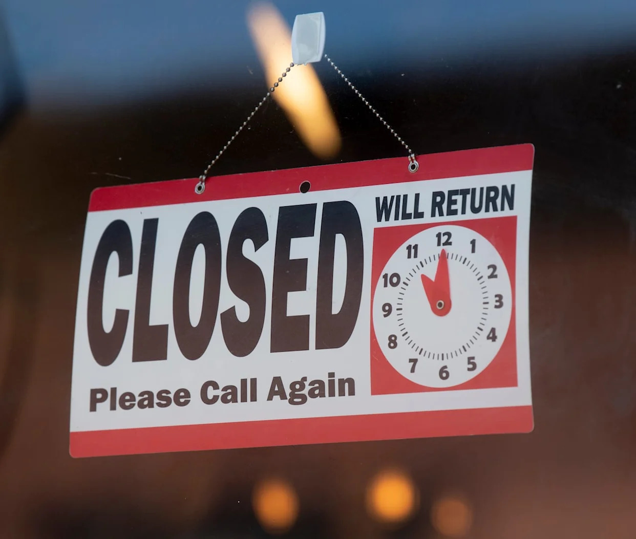 A closed sign hangs in a store window in Ottawa, Wednesday, May 6, 2020. THE CANADIAN PRESS/Adrian Wyld (Adrian Wyld/The Canadian Press - image credit)
