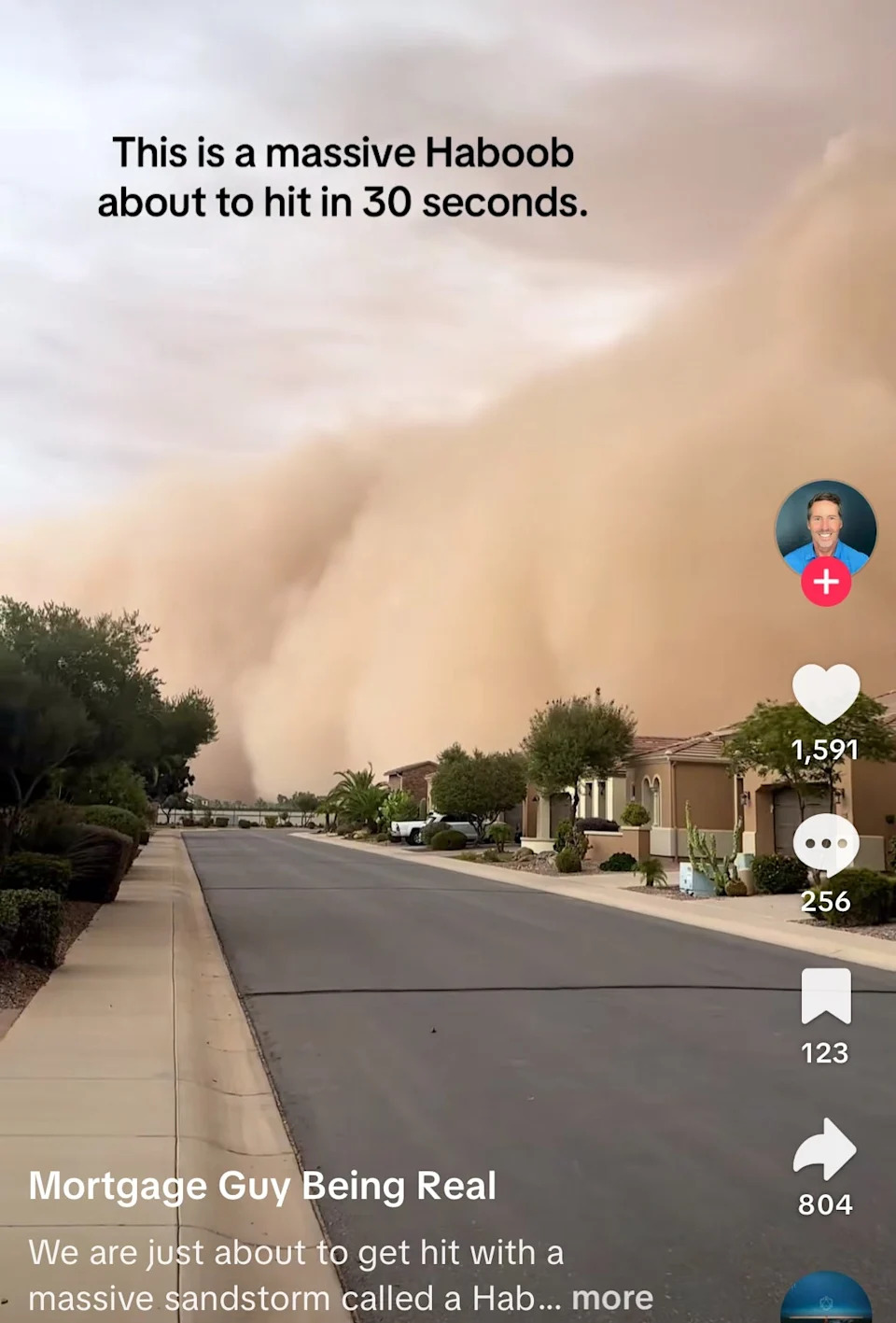 Massive sandstorm, known as a haboob, approaches a suburban street. Text reads about impending hit in 30 seconds. TikTok interface visible on screen