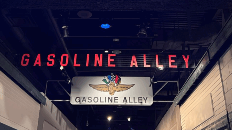 The iconic Gasoline Alley—my favorite part of the museum, where walking through garage recreations from 1911 to today felt like experiencing the evolution of automotive innovation firsthand