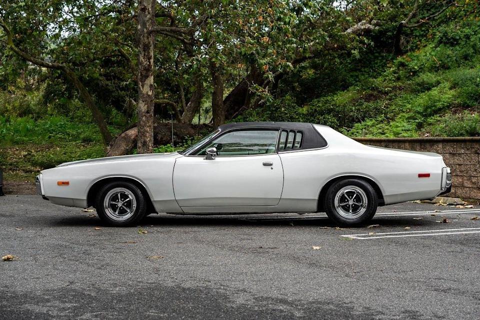 Live at Clasiq Auctions is this 1973 Dodge Charger