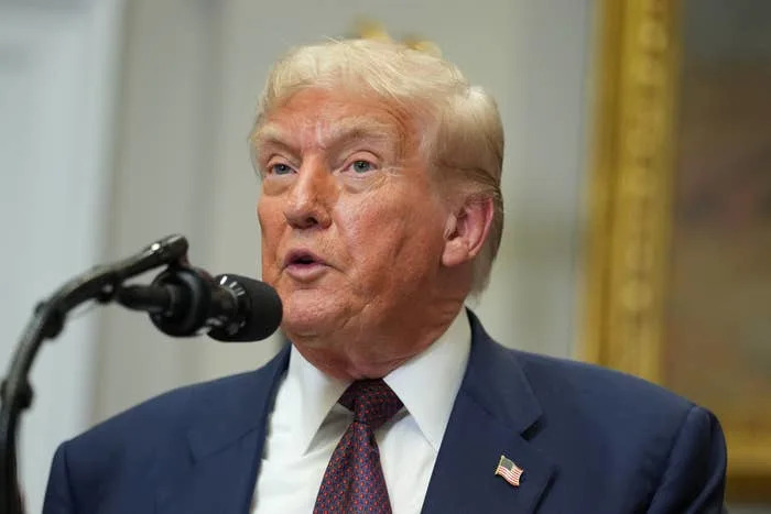 Donald Trump speaks during an executive order signing ceremony in the Roosevelt Room of the White House