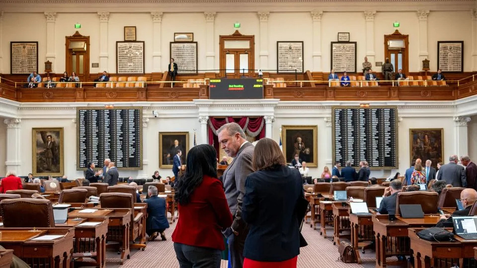 Lawmakers wait in line to debate a redistricting bill in the Texas House on August 20 in Austin. - Brandon Bell/Getty Images