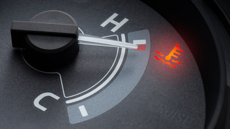 Temperature gauge needle indicating an overheating engine