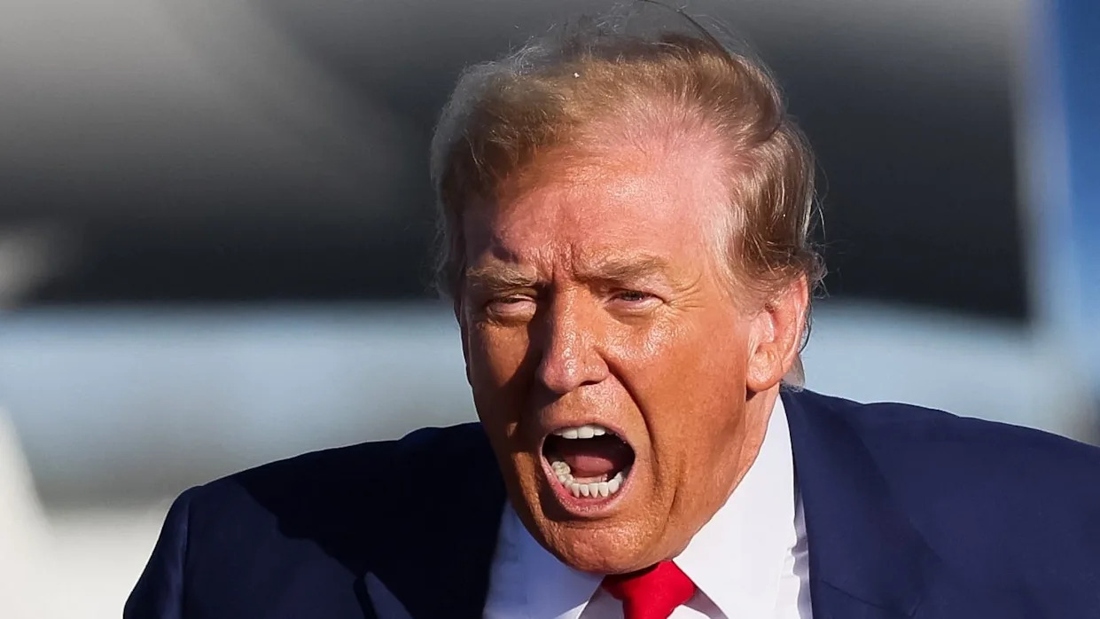 Donald Trump shouts during a campaign event in Freeland, Michigan, U.S. May 1, 2024.