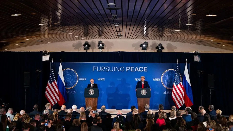 Russian President Vladimir Putin and US President Donald Trump hold a press conference after their meeting at Joint Base Elmendorf-Richardson in Anchorage, Alaska, on Friday. - Al Drago/Bloomberg/Getty Images