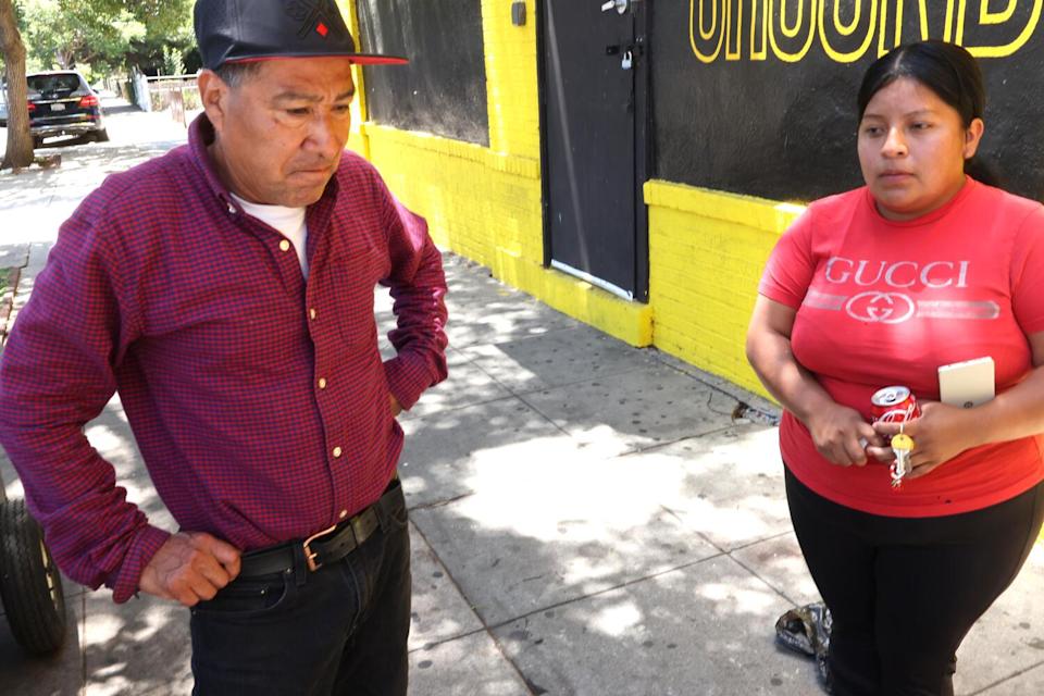 LOS ANGELES, CA - JULY 25, 2025 - - Obeth Hernandez, right, stands with her father-in-l