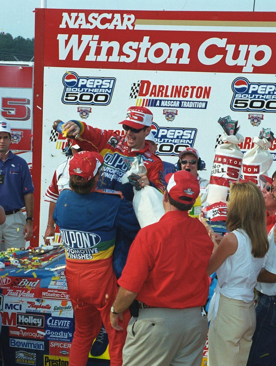 jeff gordon is picked up by his crew...