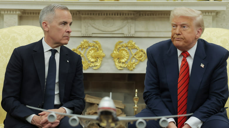 WASHINGTON, DC - MAY 06: Canadian Prime Minister Mark Carney listens as U.S. President Donald Trump speaks to reporters in the Oval Office at the White House on May 6, 2025 in Washington, DC.