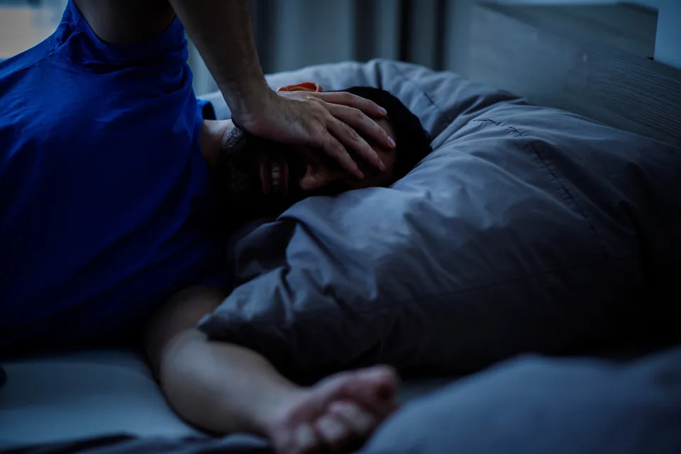 STOCK PHOTO/Getty Images - PHOTO: A man has insomnia/lack of sleep in an undated stock photo.