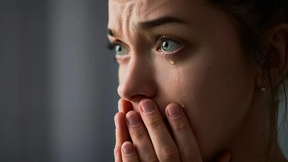 A woman is crying.