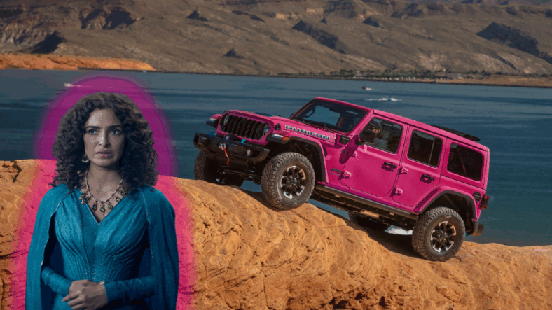 Triss Merigold standing next to the Jeep Wrangler Rubicon in Tuscadero Pink