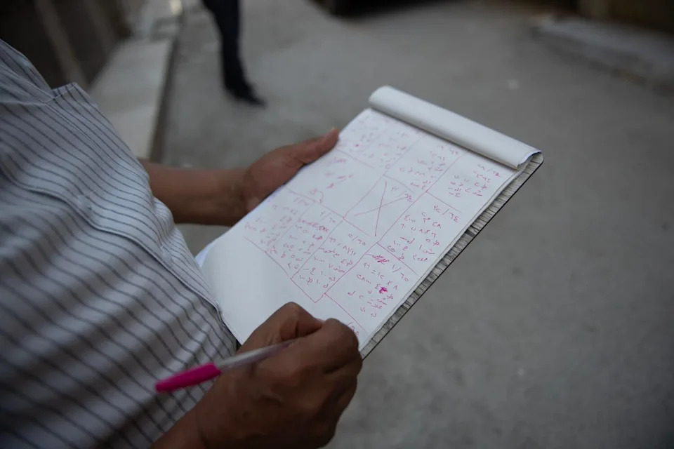 an engineer working to survey the damaged buildings