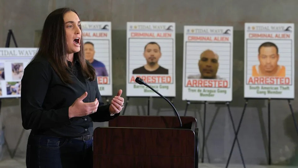 Deputy Director, US Immigration and Customs Enforcement Madison Sheahan speaks during a press conference, in front of posters of people that law enforcement arrested, held at the ICE-Enforcement and Removal Operation office on May 1, in Miramar, Florida. - Joe Raedle/Getty Images/File