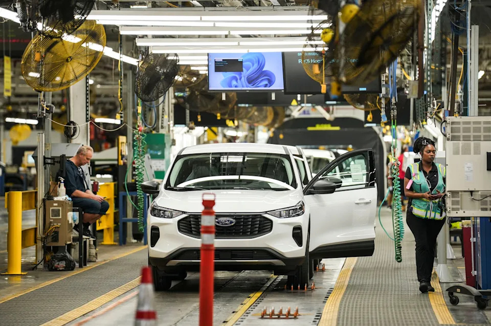 Ford Motor Company workers at the Louisville Assembly Plant Monday morning, August, 11, 2025 where the giant auto and truck manufacturer announced plans to invest $5 billion and create roughly 4,000 jobs focused on EV production across the Louisville Assembly Plant and the BlueOval Battery Park in Michigan. The company touted the EV investment will create a new production line with a more comfortable work environment.