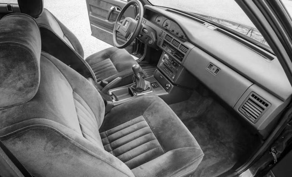 interior view of a car emphasizing the seating and dashboard layout