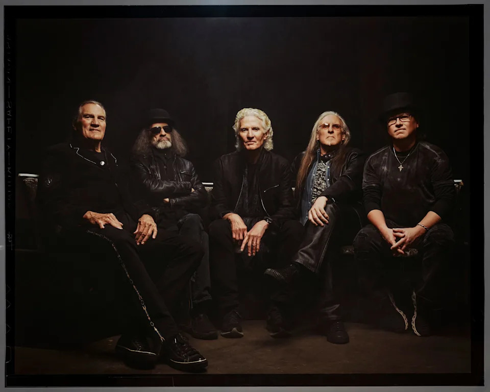 Grand Funk Railroad (Pictured L-R: Max Carl (vocals), Mel Schacher (bass guitar), Don Brewer (drummer), Mark Chatfield (guitar), Tim Cashion (keyboardist).