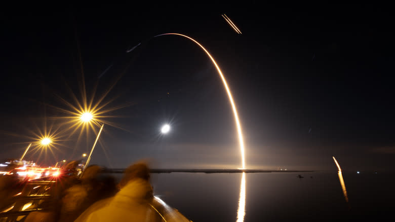SpaceX Falcon Heavy conducts USSF-52 launch for the United States Space Force from Launch Complex 39A at Kennedy Space Center carrying a Boeing X-37B Orbital Test Vehicle at 8:07 p.m. ET, viewed from the A. Max Brewer Bridge in Titusville, Florida.