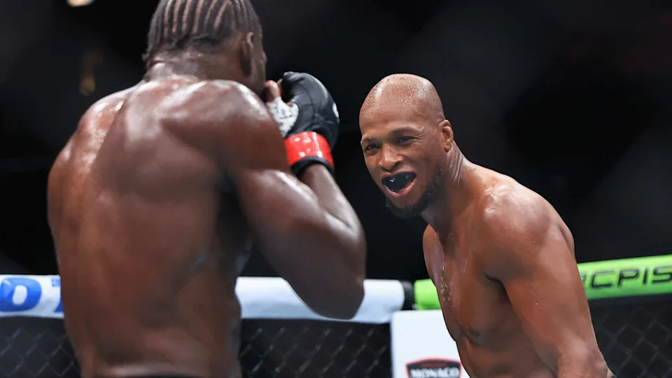 CHICAGO, ILLINOIS - AUGUST 16: Michael Page of England reacts while fighting Jared Cannonier of the United States during their middleweight bout  in UFC 319 at the United Center on August 16, 2025 in Chicago, Illinois. (Photo by Geoff Stellfox/Getty Images)