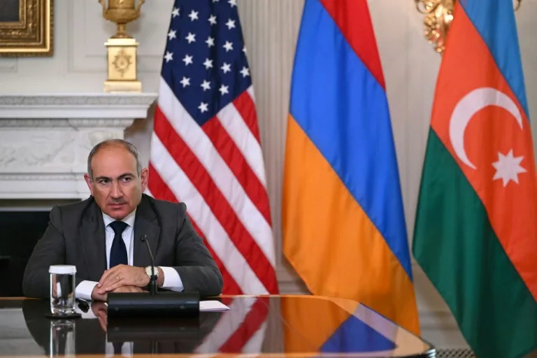 Armenian Prime Minister Nikol Pashinyan looks on during a trilateral signing with US President Donald Trump and Azerbaijani President Ilham Aliyev in the State Dining Room of the White House in Washington, DC on August 8, 2025 (ANDREW CABALLERO-REYNOLDS)