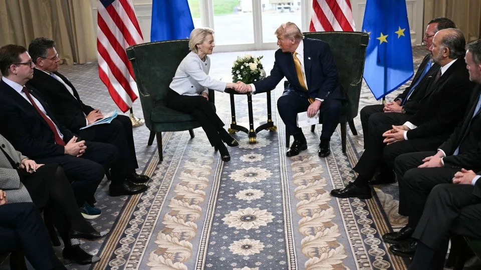 US President Donald Trump shakes hands with European Commission President Ursula von der Leyen in Turnberry, Scotland, on Sunday. - Brendan Smialowski/AFP/Getty Images