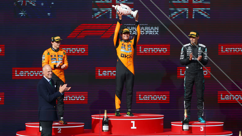 McLaren F1 driver Lando Norris celebrates a win.