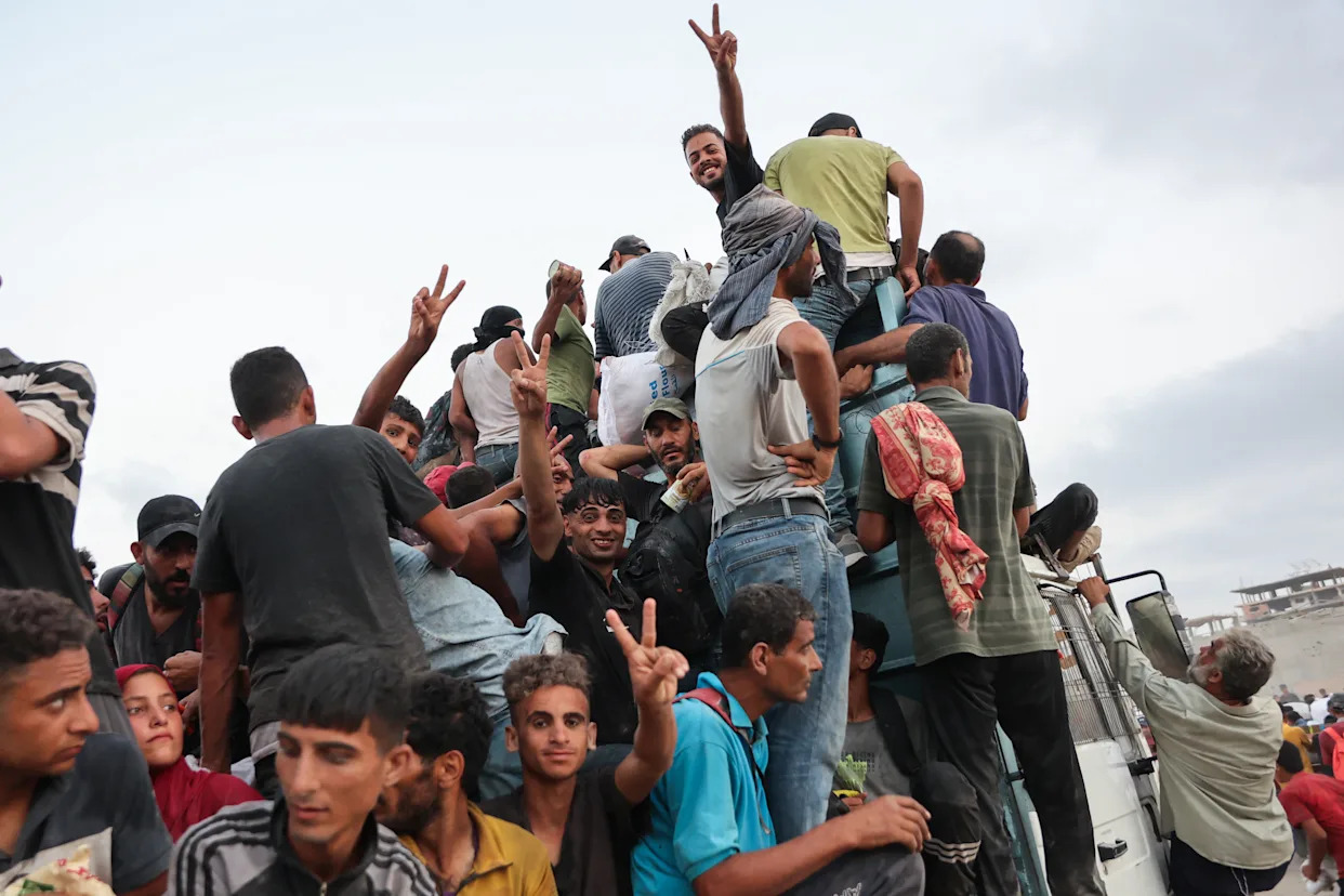 At least 20 Palestinians killed after aid truck overturns in central Gaza