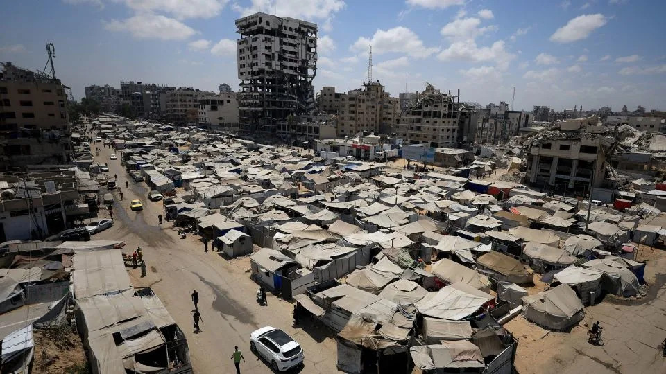 Palestinians, displaced by the Israeli offensive, shelter in a tent camp as the Israeli military prepares to relocate residents to southern Gaza, in Gaza City on Sunday. - Dawoud Abu Alkas/Reuters