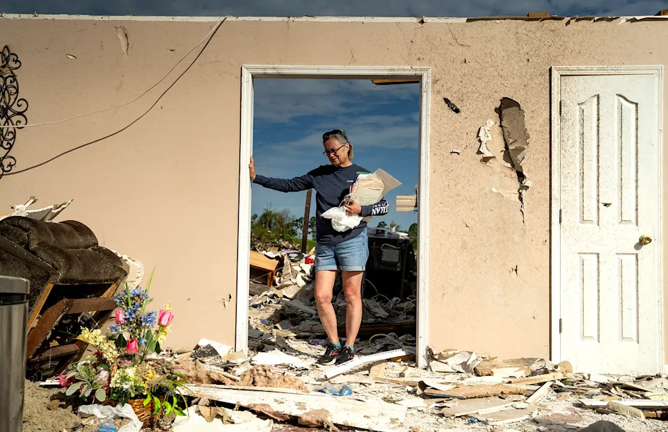 Lesly Karen Cornett stands among the debris of her house outside London, Ky., on May 18. (Michael Swensen / Getty Images)