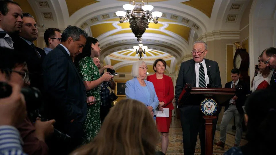 Senate Minority Leader Chuck Schumer is joined by Sen. Patty Murray and Sen. Amy Klobuchar while talking to reporters following the weekly Democratic Senate policy luncheon at the US Capitol on July 29 in Washington, DC. - Chip Somodevilla/Getty Images