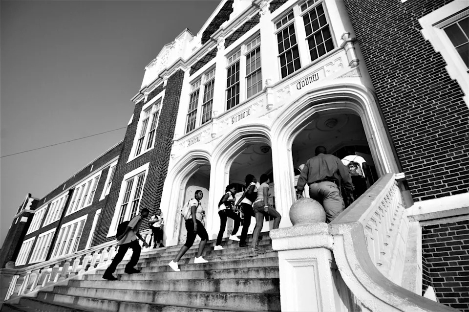 High school students make their way up the stairs on the first day of school at Academy of Richmond County, Monday, Aug. 9, 2010.