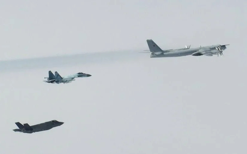 North American Aerospace Defence Command (NORAD) F-35 Lightning II fighter aircraft positively identify and intercept Russian TU-95 and Su-35 military aircraft over the Bering Sea, on July 22, 2025
